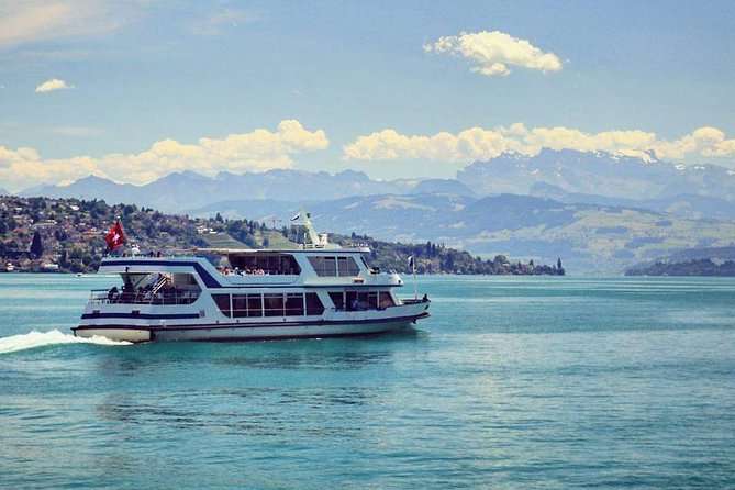 3 in 1: Zurich Walking Tour - Cruise on the Lake - Cable Car Ride to Felsenegg - Old Town walking segment: Bahnhofstrasse, Paradeplatz, Limmatquai, and the church signals