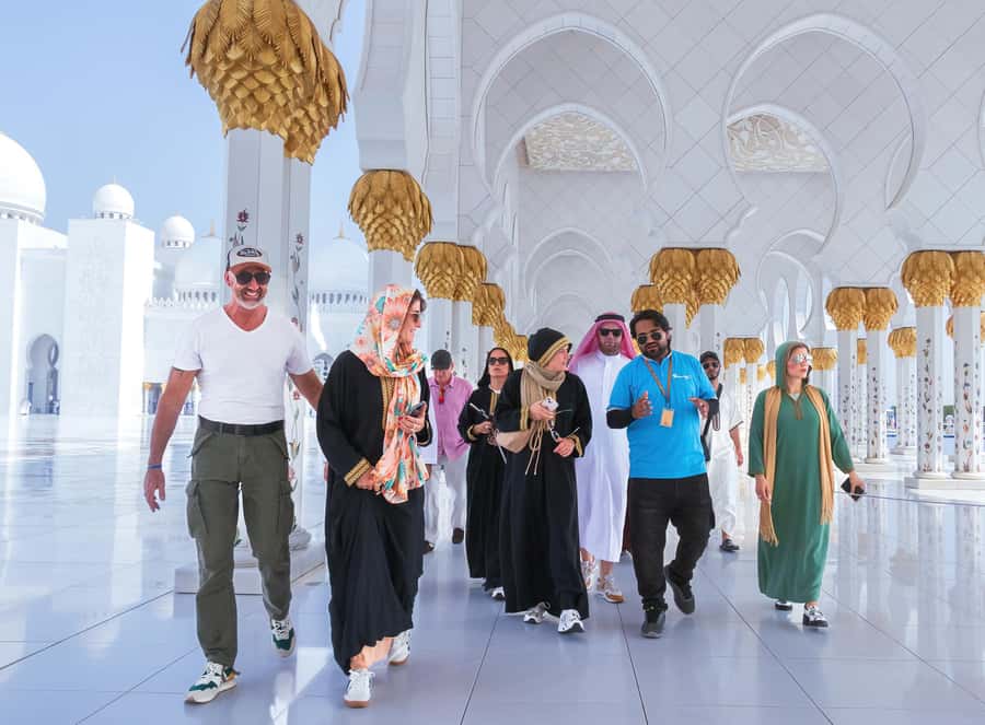 Abu Dhabi: Guided Walking Tour at Sheikh Zayed Grand Mosque - The Walk to the Mosque: Expect Scale, Light, and Constant Detail