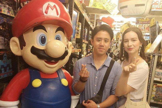 Akihabara Anime & Game Adventure Walking Tour (Group or Private) - Taito Station Akihabara: arcade classics right by the Space Invaders sign