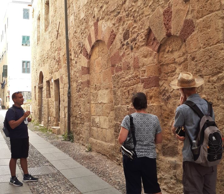 Alghero: Historic Center Walking Tour with A Local Guide - Churches, squares, and the Catalan-leaning atmosphere