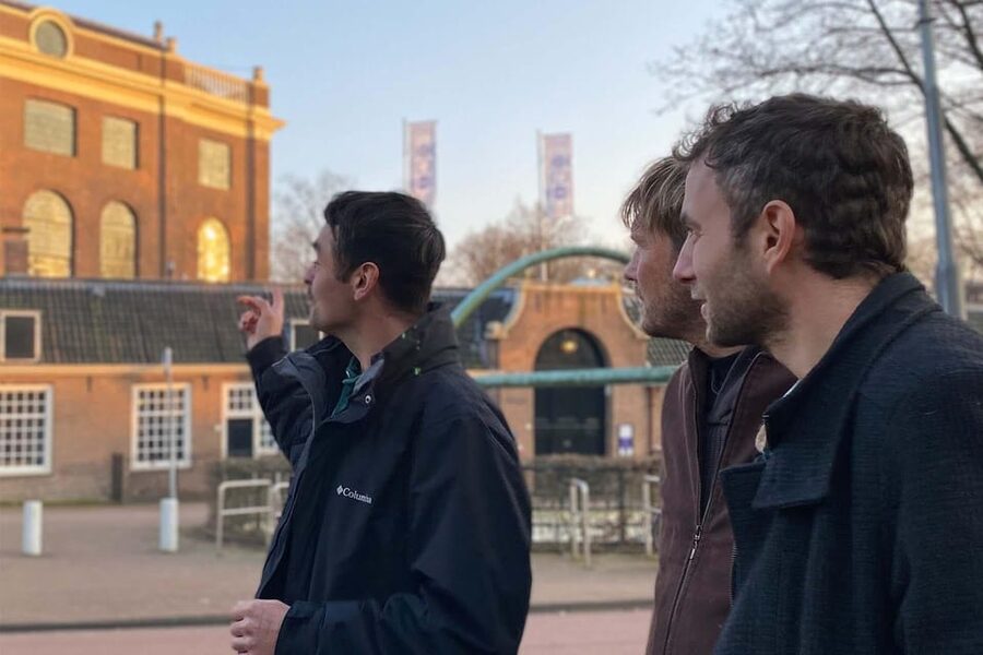 Amsterdam: Anne Frank Guided Small Group Walking Tour - Nieuwezijds Voorburgwal 120: connecting street-level details to the diary