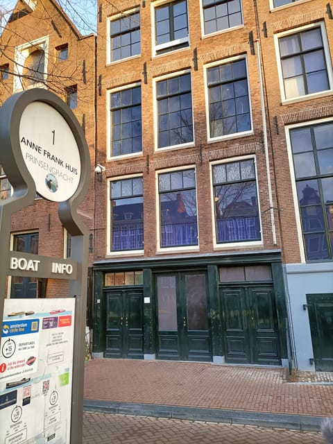 Amsterdam: Anne Frank Guided Small Group Walking Tour - Blauwburgwal: seeing how memory sits inside the city