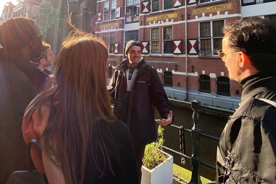 Amsterdam: Anne Frank Guided Small Group Walking Tour - Starting at Beursplein 5: find the bull, then get the story right away