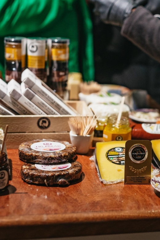 Amsterdam: Food and Culture Walking Tour with Tastings - Flower Market tastings: warm stroopwaffle energy to start