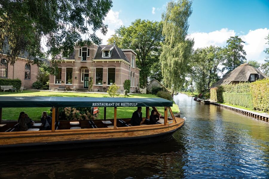 Amsterdam: Giethoorn Tour Scenic Cruise, Cheese & Free Time - Start Smart in Amsterdam: Overhoeksplein and a Clear Getting-There Plan
