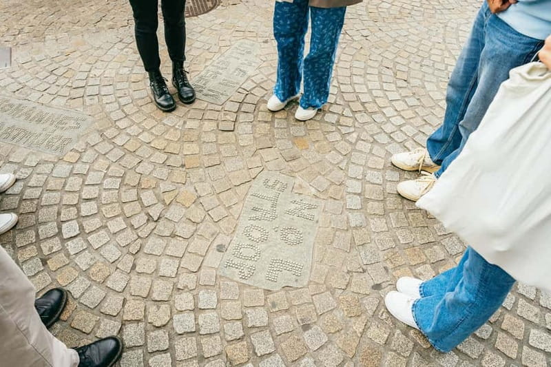 Amsterdam: Guided Cultural Walking Tour - Amstel River return and the WWII memorial meaning shift