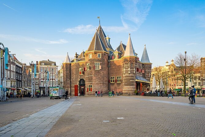 Amsterdam History Walking Tour - Dam Square: the heart of the city and the center of big stories