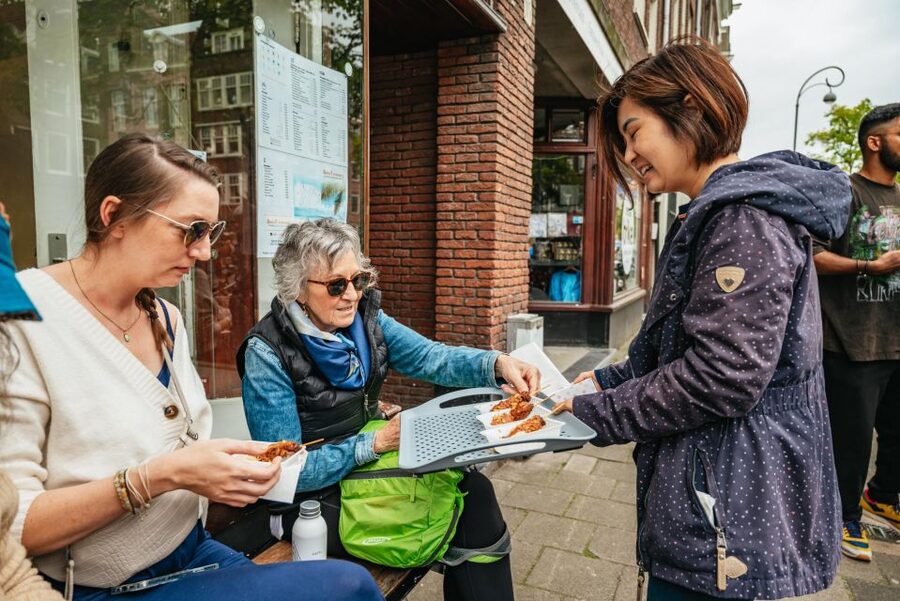 Amsterdam: Jordaan District Local Food Walking Tour - What to Bring for a Rain-or-Shine Canal Day