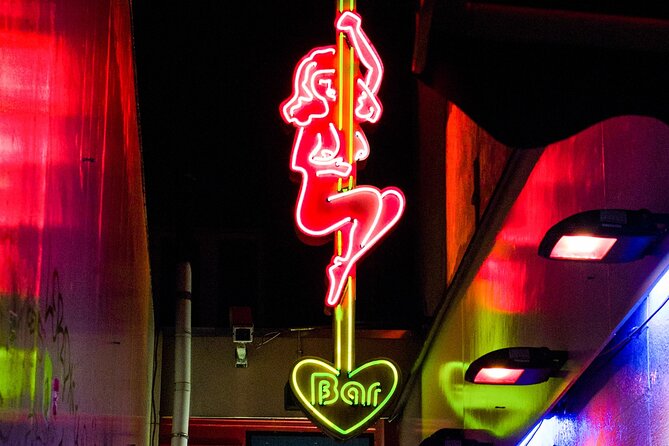 Amsterdam Red Light District Walking Tour in EN/DE/IT/ES - Amsterdam Centraal: legality, window systems, and what the city does
