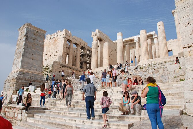 Athens: Acropolis, Parthenon Guided Walking Tour - The climb reality: shoes, water, and slipping stone