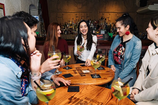 Barcelona Dark History Night Walking Tour With Drinks - El Born after dark: red-light legends, a hidden graveyard, and your first sips