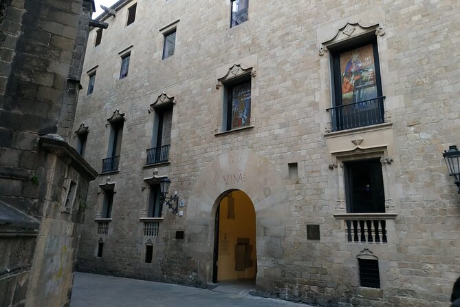 Barcelona Gothic Quarter Walking Tour with Tapas - Pont del Bisbe: photos first, then the secrets underneath