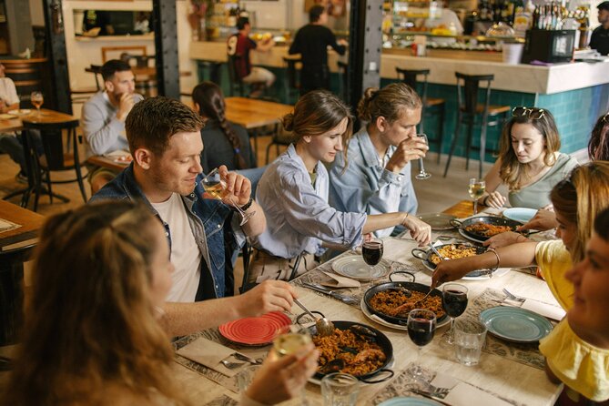 Barcelona: Guided Food Walking Tour with Tapas and Wine - The Grand Finale on Carrer d’Avinyó: Paella, Cava, and Dessert