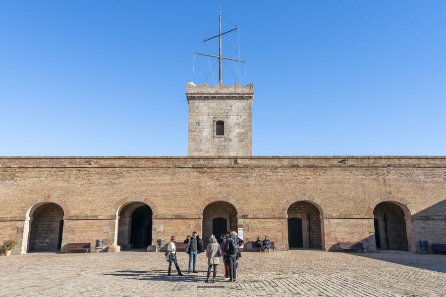 Barcelona: Walking tour with Montjuic Castle & Cable Car - Montjuïc Castle Inside: Dungeons, Tower, and Pyrenees Days
