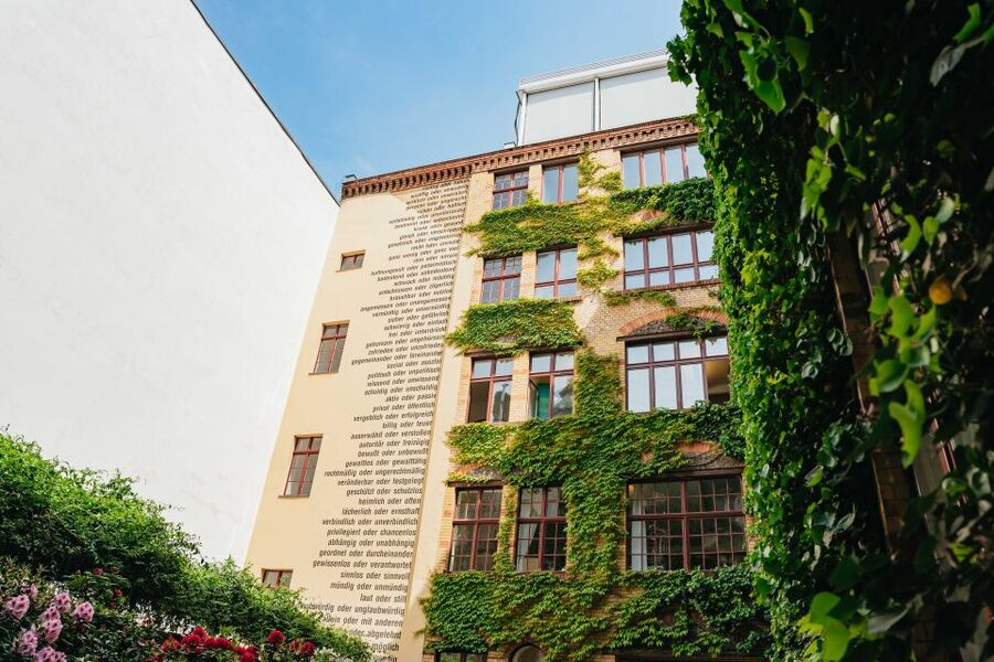 Berlin: Hidden Backyards Guided Walking Tour - Heckmann Höfe: The Color, the Trees, and the Local Hangout
