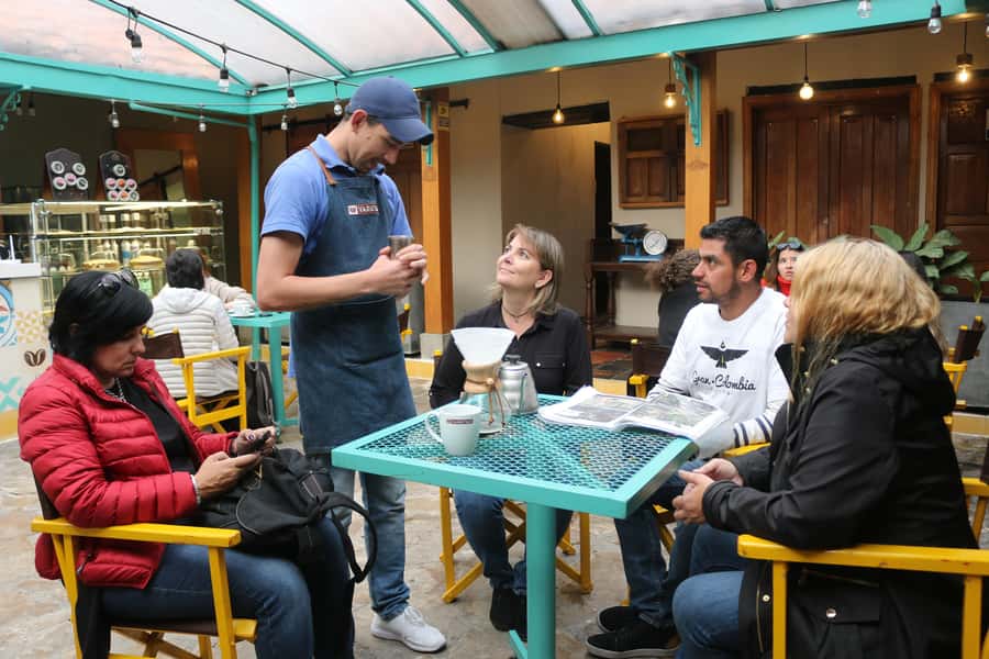 Bogotá City Tour with Monserrate, Gold and Botero Museums - La Candelaria and Chorro de Quevedo: where the story starts on cobblestones