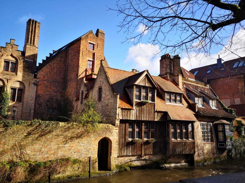 Bruges: Guided Walking Tour - Huidenvettersplein (Tanners Square) and the “working city” feel