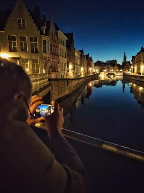 Bruges: Nightly Tales and Untold History Walking Tour - Canal-side streets and the bridges: Potterierei, Augustijnenrei, Augustijnenbrug