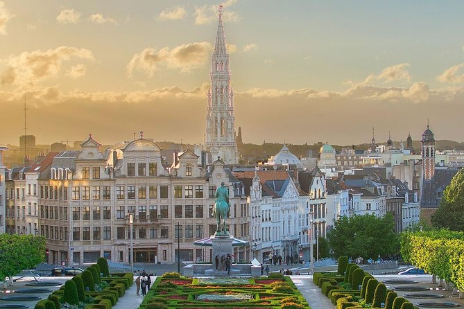 Brussels: Historical Walking Tour with Chocolate & Waffle Tasting - Place De La Vieille Aux Bles and Place St Jean: Symbolic Brussels in Small Bites