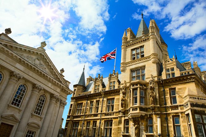 Cambridge University Walking Tour - Quick stops that add texture: Corpus Clock, The Eagle, and Old Cavendish