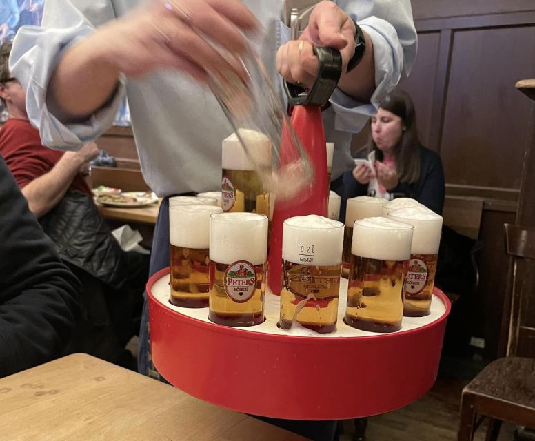 Cologne: 3 Old Town Breweries Guided Walking Tour - Heinzelmännchenbrunnen Sets the Tone for a Cologne Kölsch Crawl