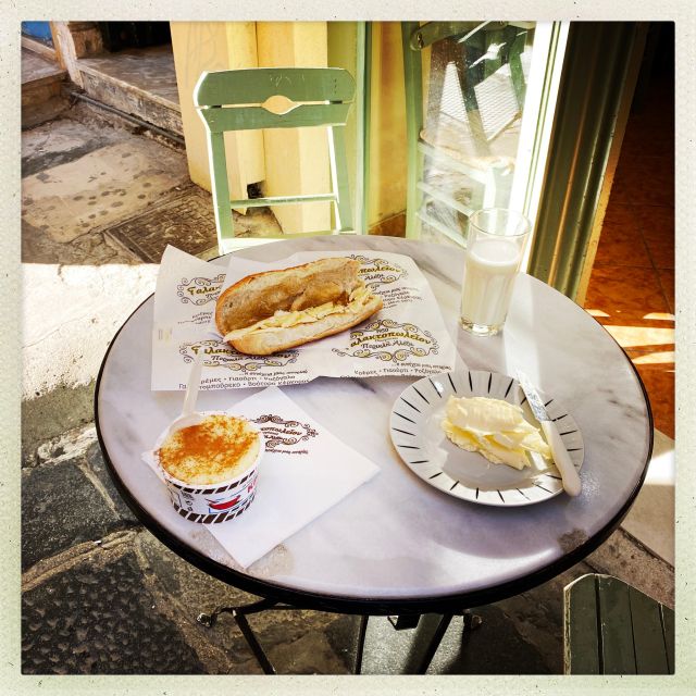 Corfu Town: Guided Walking Tour and Local Food Tastings - Hidden squares, old walls, and fountains: why the center feels different