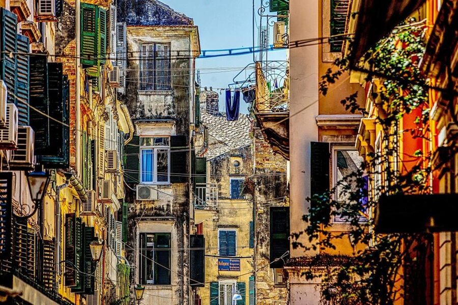 Corfu Town: Guided Walking Tour and Local Food Tastings - Sweet stops and pantry favorites: halva, honey, olive oil