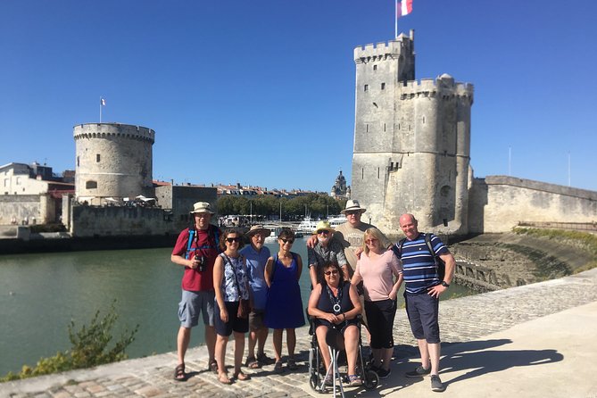 Discover La Rochelle: Discovery Walking Tour of La Rochelle - Porte de la Grosse-Horloge and the story of walls, gates, and trade