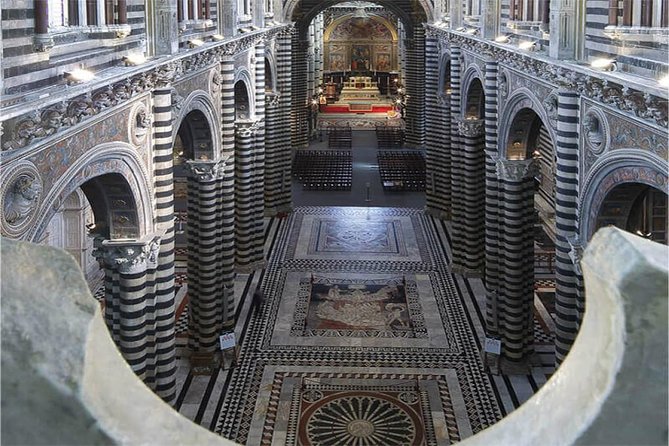 Discover the Medieval Charm of Siena on a Private Walking Tour - Battistero di San Giovanni: the unfinished upper part and why it matters
