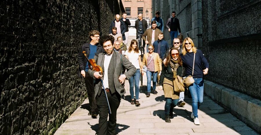 Dublin: Irish Music Walking Tour with Live Performance - Street songs of Dublin: foot-stamping to forlorn lament