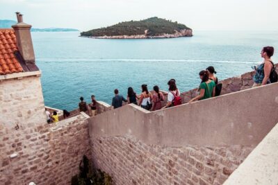 Dubrovnik: Ancient City Walls & Wars Walking Tour - Where the tour starts: finding Dubrovnik Walks under the orange umbrella