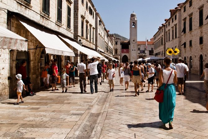 Dubrovnik Discovery Old Town Walking Tour - Finishing at Porat Dubrovnik: ending near the action by the port