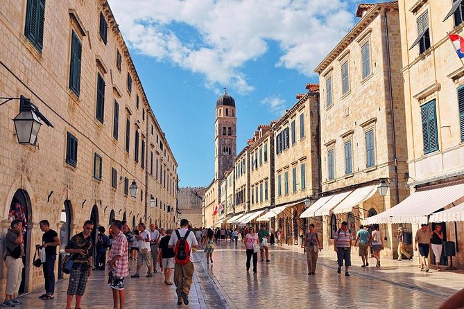 Dubrovnik: Old Town Walking Tour - Starting at Brsalje 8: finding Dubrovnik Walks under the orange umbrella