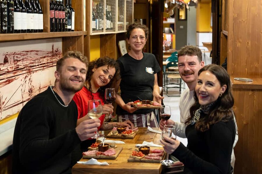 Florence: Food Walking Tour with Local Steak and Tuscan Wine - Santo Spirito at dusk: why this route feels more local