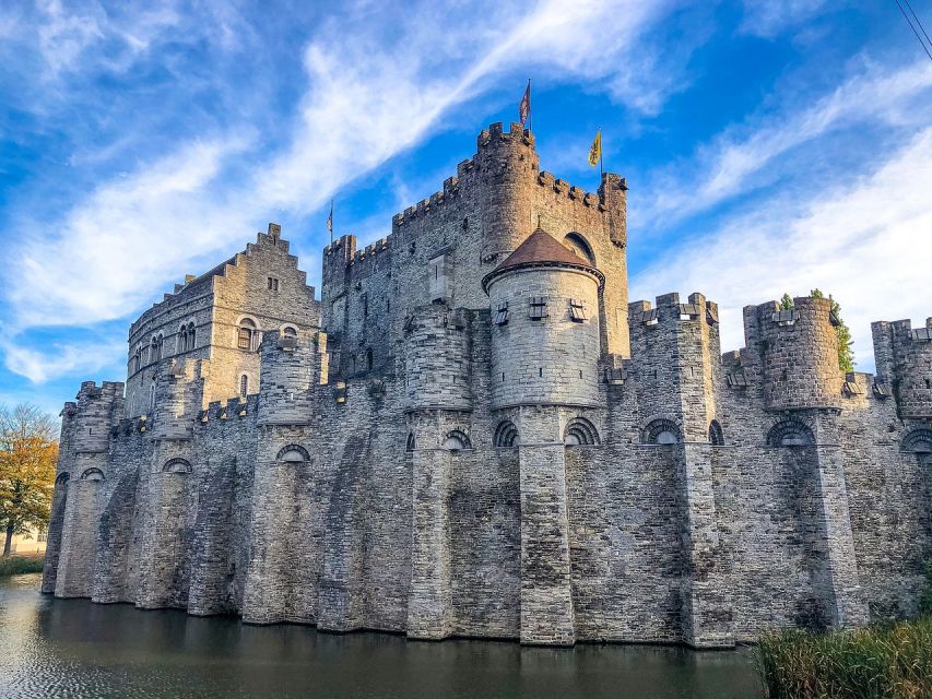 Ghent: Guided Walking Tour and Canal Boat Trip - Radios, pacing, and what the 150 minutes really feel like