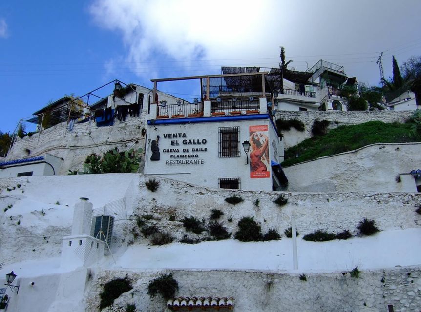 Granada: Albaicín and Sacromonte 2.5-Hour Walking Tour - Sacromonte: walking into the cave neighborhood on the mountain side