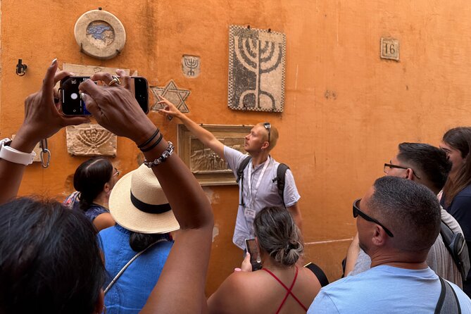 Highlights of Jewish Ghetto And Trastevere Walking Tour - Tiber Island: a myth-and-medicine pause in the middle of Rome