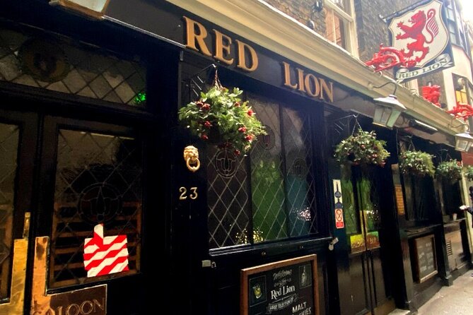 Historic Pub Walking Tour of London - Finding the meeting point: Embankment Pier Exit and the yellow umbrella