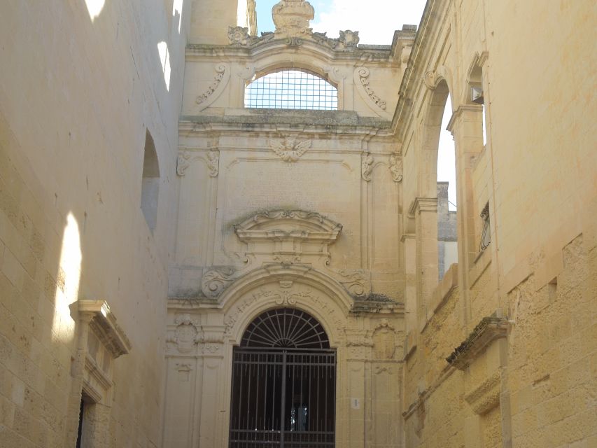 Lecce: Street Food Tasting and Sightseeing Tour - Piazza Sant’Oronzo: Roman echoes, a she-wolf, and the Clock of Wonders