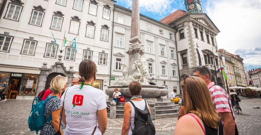 Ljubljana: Slovenian Cuisine Walking Tour with Tastings - Meeting at Triple Bridge and Getting Your Ljubljana Bearings