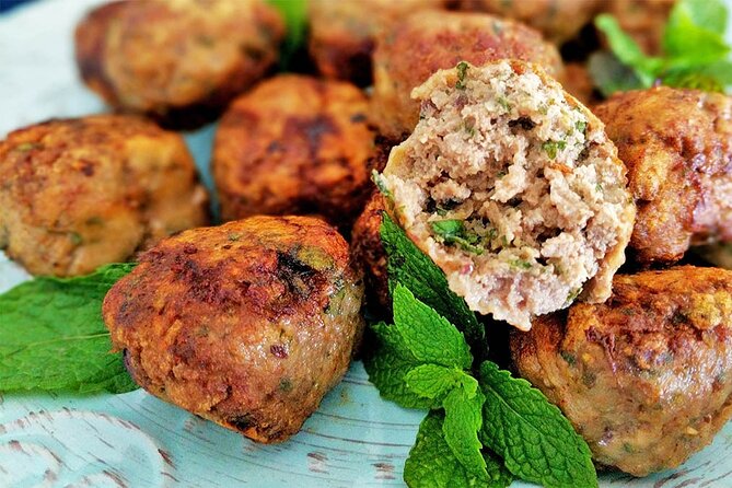 Local food experience & walking tour of Tirana - The New Bazaar meal and grape raki finale