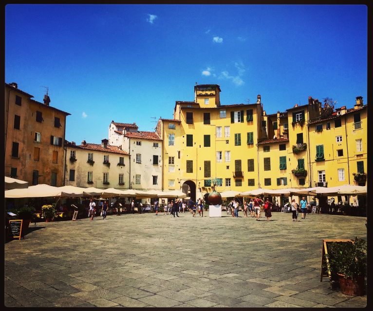 Lucca: 2-Hour City Center Walking Tour - San Frediano and Piazza Anfiteatro: layers that still feel real