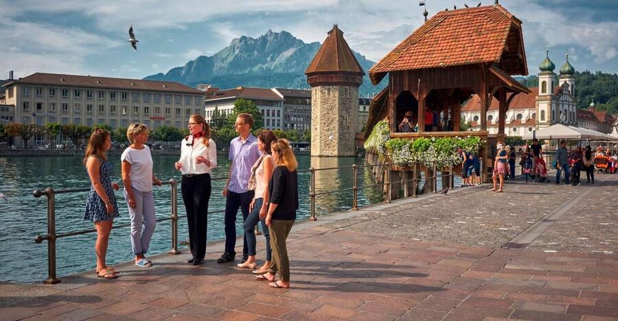 Lucerne: Guided Walking Tour with an Official Guide - Chapel Bridge and the Octagonal Water Tower: Lucerne’s Signature Landmark