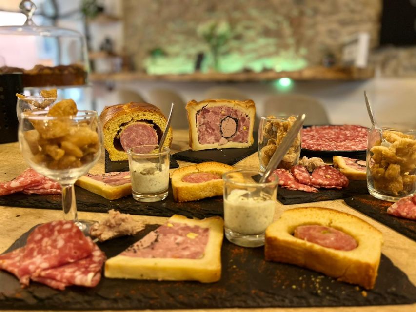 Lyon: Food Walking Tour with a Local Guide - Your First Tasting Break: Cold Cuts and Red Wine in Lyon Style