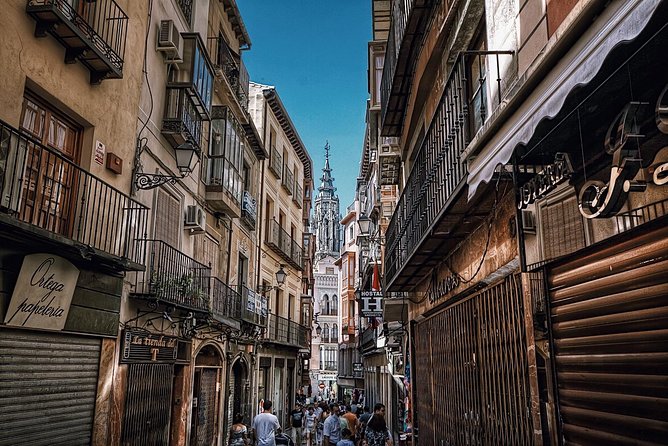 Madrid Old City Guided Exclusive Guided Walking Tour - Puerta Cerrada: Medieval Fort Origins in a Busy Neighbourhood