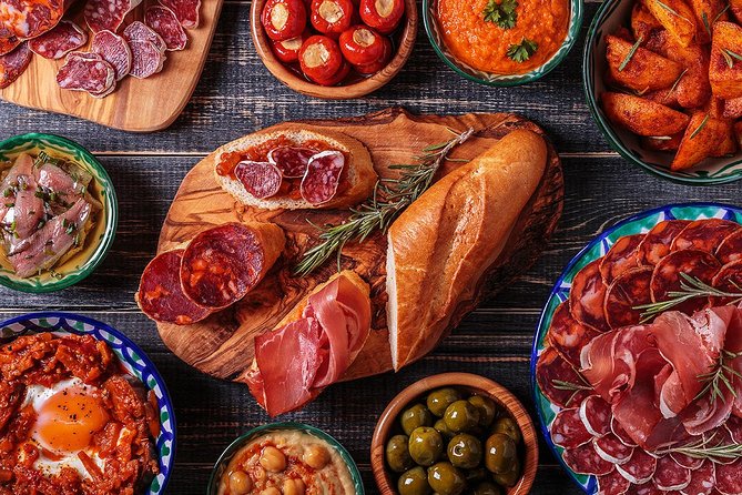 Madrid Tapas Experience Walking Tour - The jamón comparison stop: learn to shop, not just eat