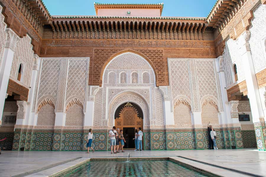 Marrakech: 3-Hour Monuments, Souks & Old Medina Walking Tour - Koutoubia Mosque, hammams, and Spice Square: everyday Marrakech signals