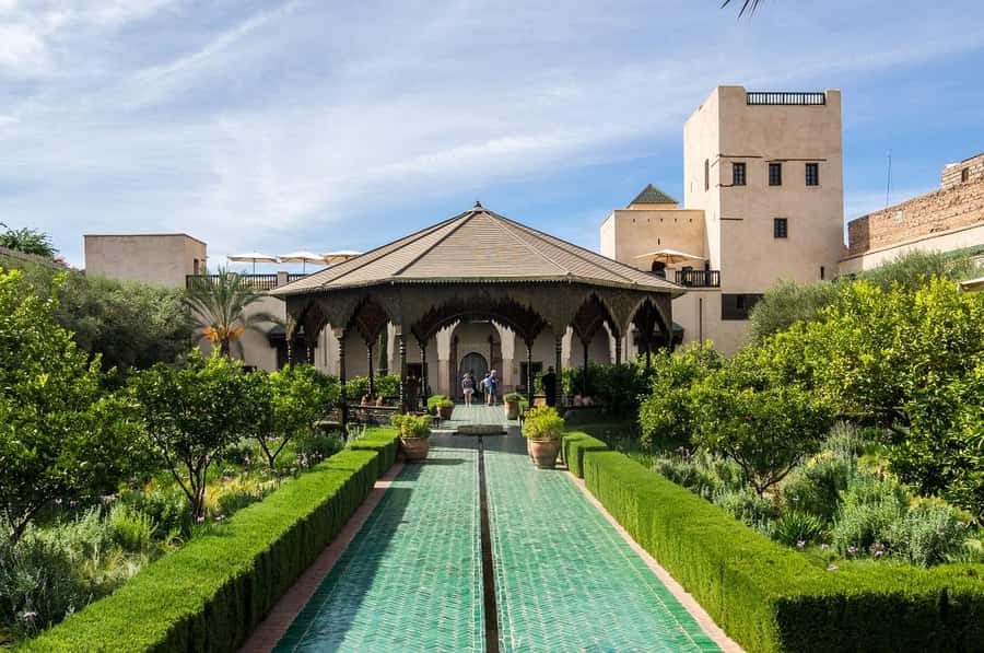 Marrakech: Ben Youssef, Secret Garden, & Souks Walking Tour - Meeting at Café de France in Jemaa el-Fnaa: The right kind of first stop