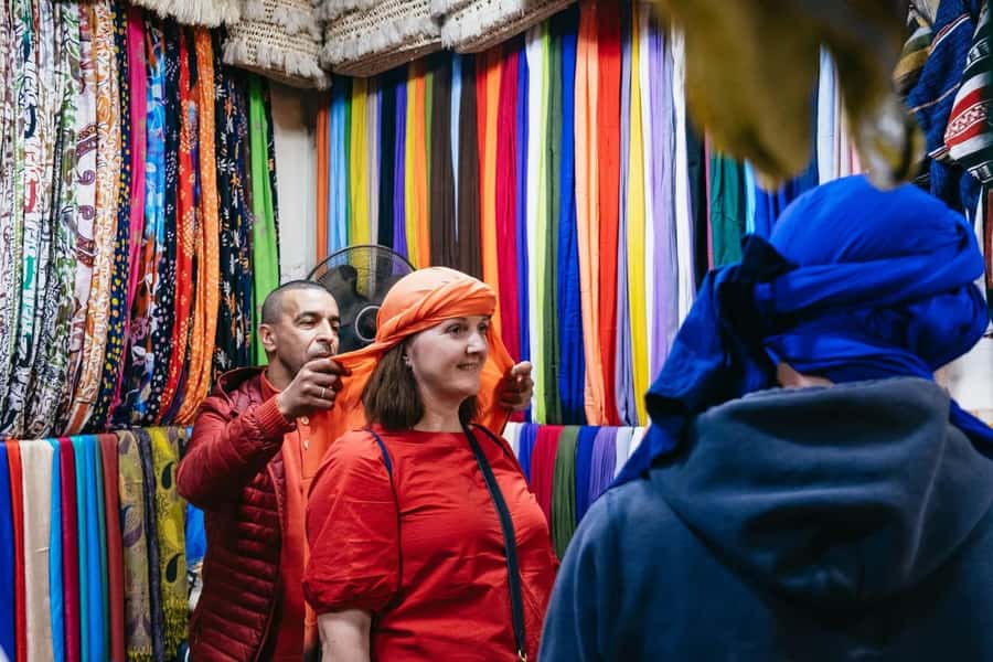 Marrakech: Ben Youssef, Secret Garden, & Souks Walking Tour - Souk Semmarine and shopping time: Color, craft, and bargaining with a guide