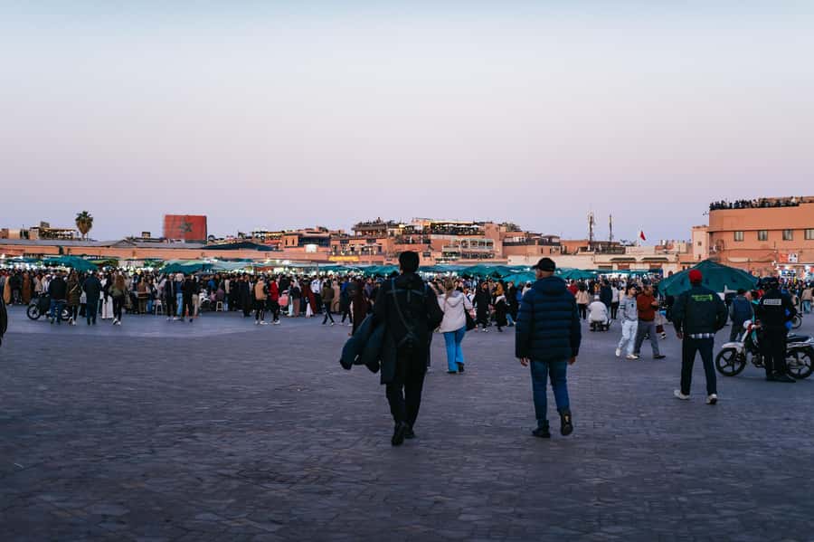 Marrakech: Medina by Night Walking Tour with Moroccan Tea - Rooftop Bar Finish Over Jemaa el-Fnaa: The View Moment